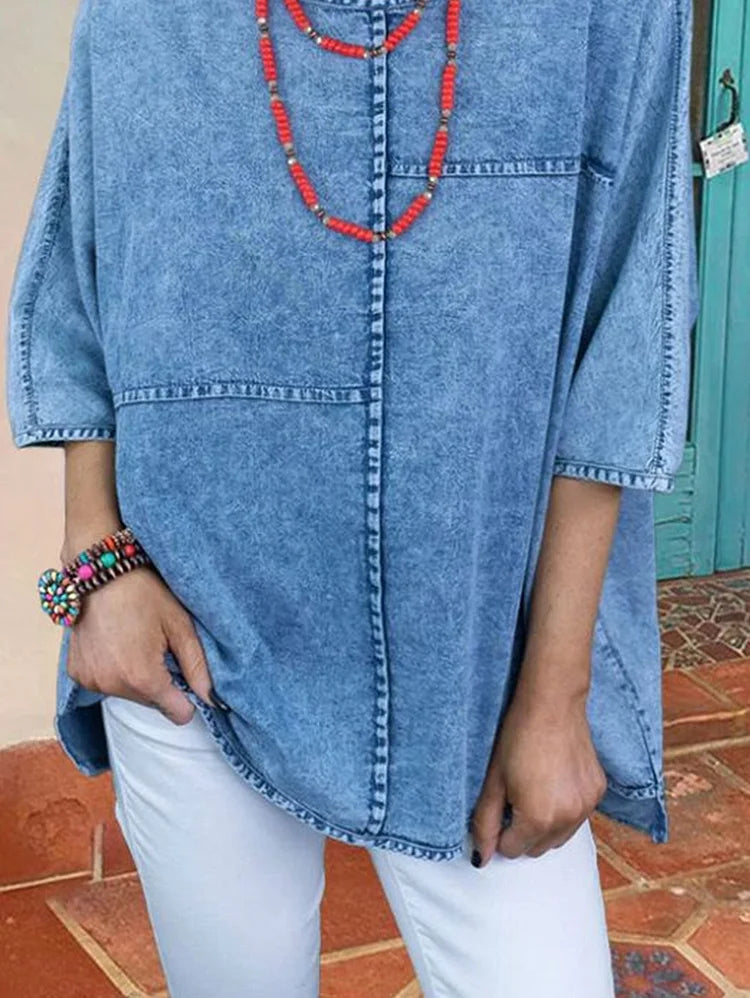 Camisa jeans solta casual com meia manga