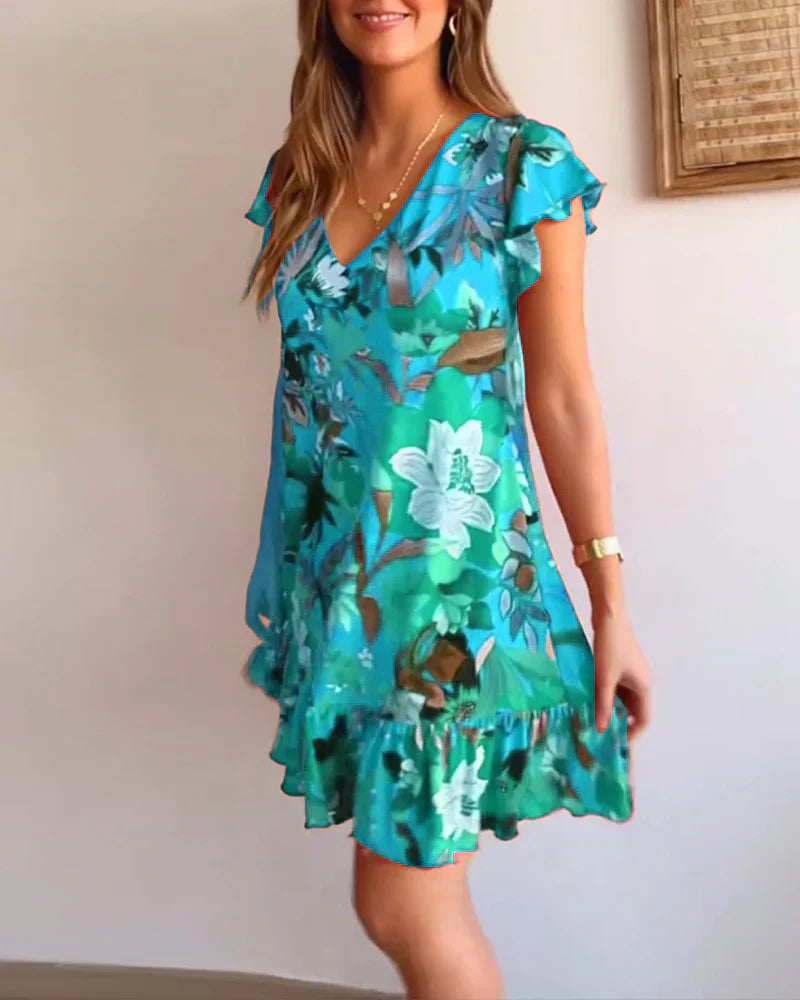 Vestido floral com babados e decote em V