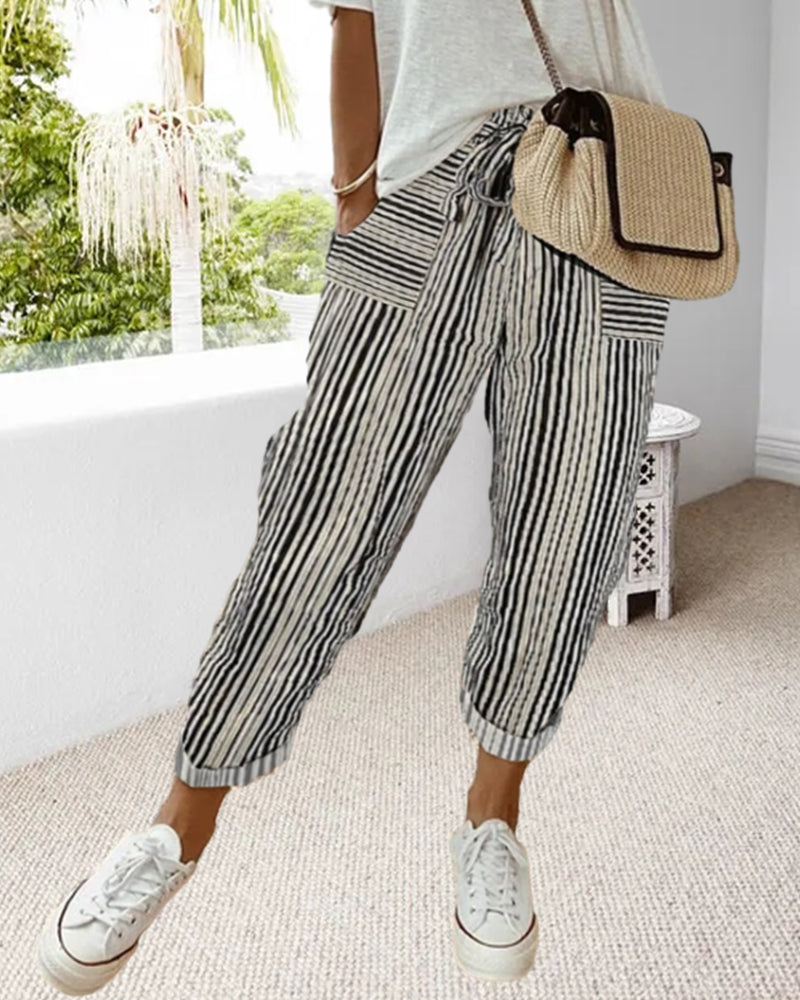 Calça de moletom com bolsos estampados