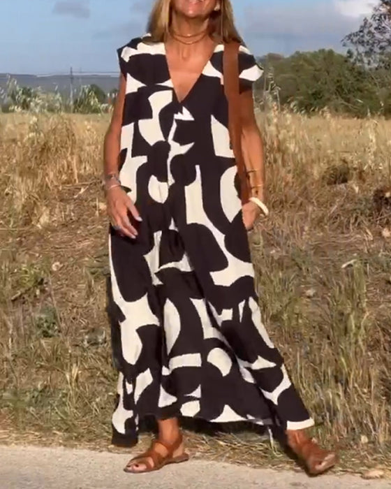 Vestido com estampa e decote em V