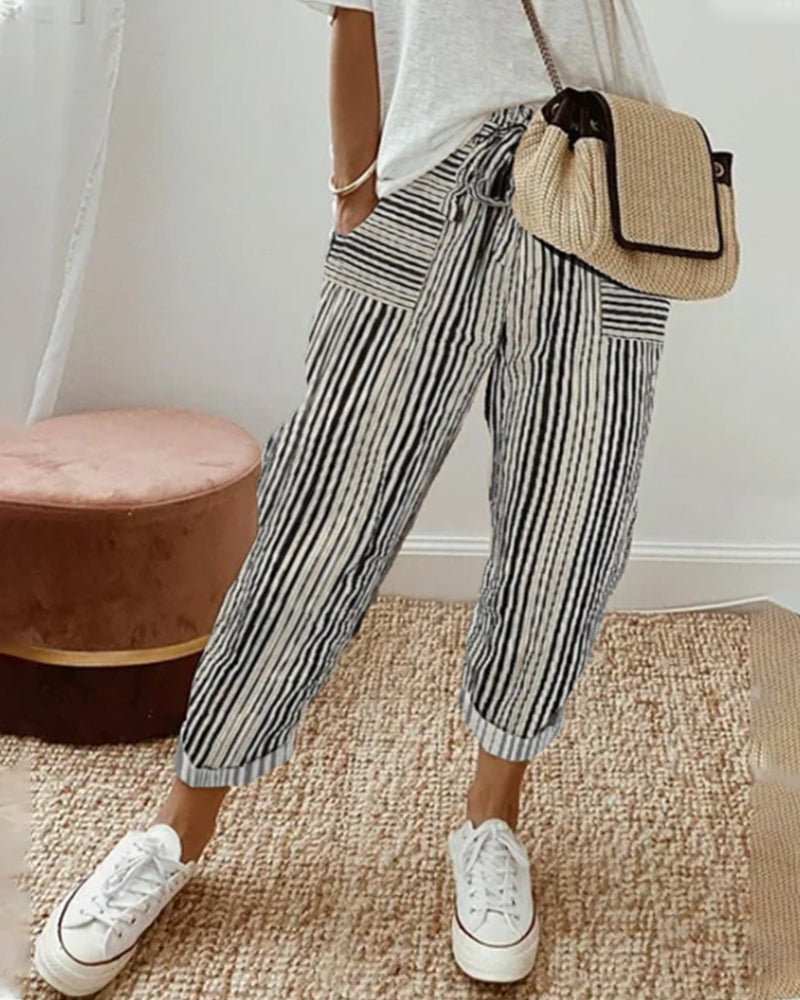 Calça de moletom com bolsos estampados