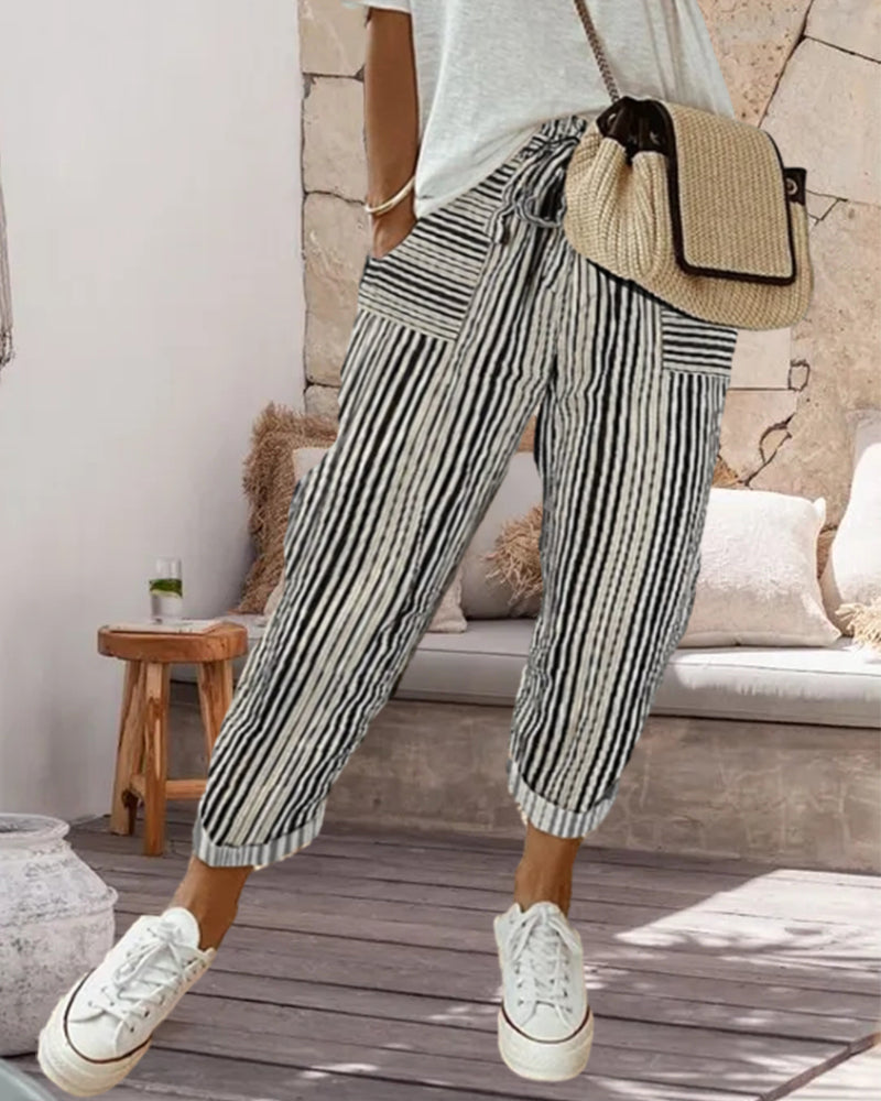 Calça de moletom com bolsos estampados